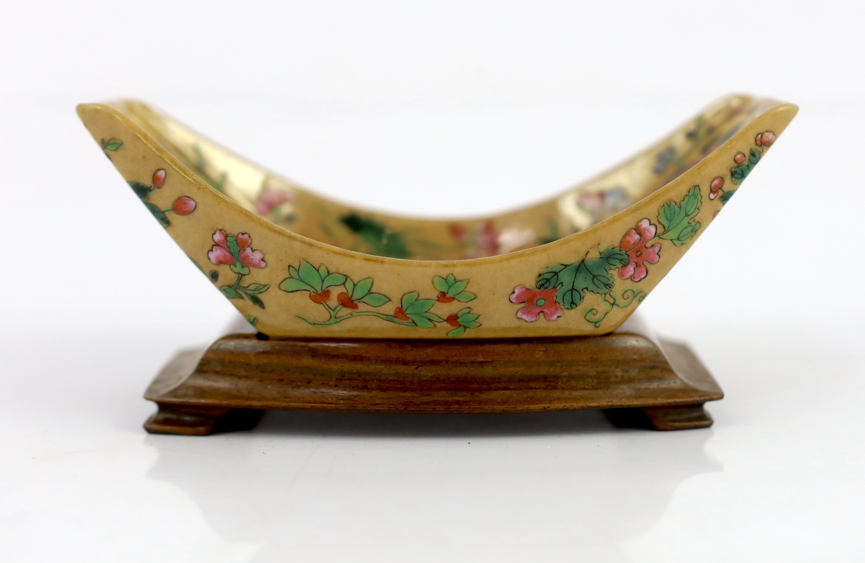 A Chinese enamelled porcelain ingot-shaped cup stand, Daoguang seal mark and of the period (1821-50)